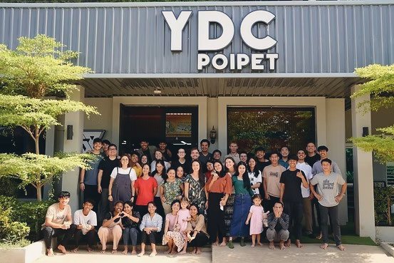 YWAM Poipet staff and students gathered outside the YDC